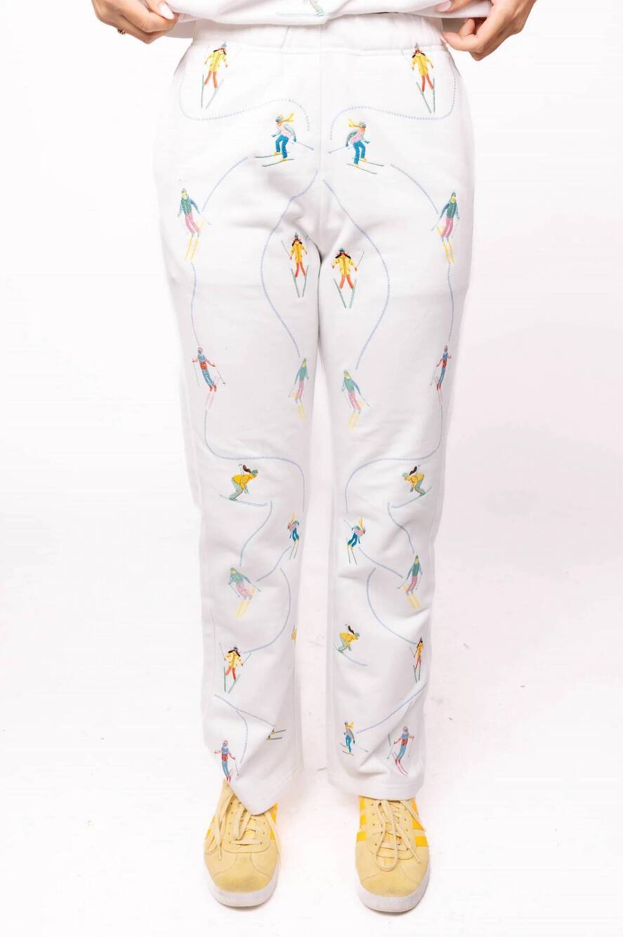 NEW QUEEN OF SPARKLES women's skier snow path sweatpant in white multi